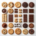 Assorted Chocolate Cookies and Chocolate Bars on White Background Flat Lay Royalty Free Stock Photo