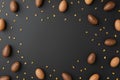 Assorted chocolate Easter eggs and golden sprinkles on dark background Royalty Free Stock Photo