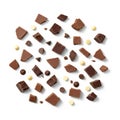Assorted chocolate pieces are scattered on a white background Royalty Free Stock Photo