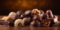 Assorted Chocolate pralines on brown background with copy space