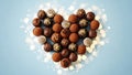 Assorted chocolates arranged in a heart shape Royalty Free Stock Photo