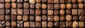 Assorted chocolates display tempting mix of flavors and shapes with copy space for branding