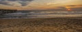 Assorted Cloud Formations at Sunrise on the Beach Royalty Free Stock Photo