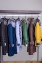 Assorted coats hanging on shop rack Royalty Free Stock Photo