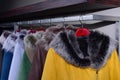 Assorted coats hanging on shop rack Royalty Free Stock Photo