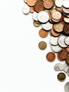 Assorted coins scattered on a white surface reflecting diverse currency denominations and materials. Generative AI Royalty Free Stock Photo