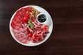 Assorted cold meat deli plate at the restaurant Royalty Free Stock Photo