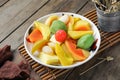 Assorted color fruit pickles, sweet and sour.