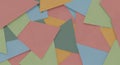 Assorted colored paper triangles are scattered, Royalty Free Stock Photo