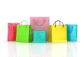 Assorted colored shopping bags including yellow,