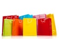 Assorted colored shopping bags on white Royalty Free Stock Photo