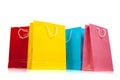 Assorted colored shopping bags on white Royalty Free Stock Photo