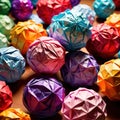 Assorted colorful crumpled paper balls, showing diverse discarded ideas