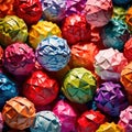 Assorted colorful crumpled paper balls, showing diverse discarded ideas