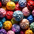 Assorted colorful crumpled paper balls, showing diverse discarded ideas