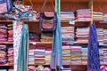 Assorted colorful fabrics on display in a shop Muttrah Souk, in Mutrah, Muscat, Oman, Middle East