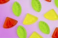 Assorted colorful fruit jelly candy on lilac Royalty Free Stock Photo