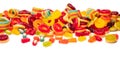 Assorted colorful gummy candies. Top view. Jelly donuts. Jelly bears. Isolated on a white background Royalty Free Stock Photo