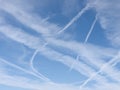 Assorted contrails aka vapour trails in sky