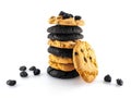 Assorted cookies arranged in a stack. Raisins scattered around Royalty Free Stock Photo
