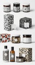 Assorted cosmetic containers and packaging featuring geometric patterns in black, Royalty Free Stock Photo