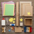 Assorted craft materials are neatly arranged on a wooden surface. Items include Royalty Free Stock Photo