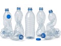 Assorted crushed and uncrushed plastic bottles with blue caps Royalty Free Stock Photo