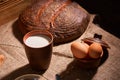 Assorted dairy products milk, cheese, eggs. rustic still life on table Royalty Free Stock Photo