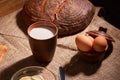 Assorted dairy products milk, cheese, eggs. rustic still life on table Royalty Free Stock Photo