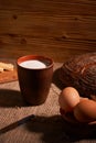 Assorted dairy products milk, cheese, eggs. rustic still life on table Royalty Free Stock Photo