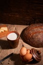 Assorted dairy products milk, cheese, eggs. rustic still life on table Royalty Free Stock Photo