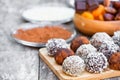 Assorted dark chocolate truffles with cocoa powder sesame seeds Royalty Free Stock Photo