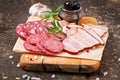 Assorted deli meats and rosemary Royalty Free Stock Photo