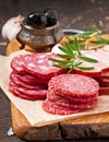 Assorted deli meats and rosemary Royalty Free Stock Photo