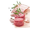 Assorted deli meats, rosemary and pepper Royalty Free Stock Photo