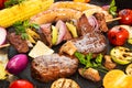 Assorted delicious grilled barbecue meat with vegetable. Beef gr Royalty Free Stock Photo