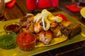 Assorted delicious grilled meat on the plate