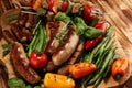 Assorted delicious grilled meat with vegetable on a barbecue. Grilled pork shish or kebab on skewers with vegetables . Food