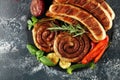 Assorted delicious grilled meat with vegetable on a barbecue with grilled sausages and vegetables on table Royalty Free Stock Photo