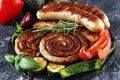 Assorted delicious grilled meat with vegetable on a barbecue with grilled sausages and vegetables on table Royalty Free Stock Photo