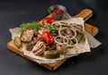 Assorted delicious grilled meat with vegetable. Mixed grilled meat with vegetables. Mixed grilled meat on wooden platter Royalty Free Stock Photo
