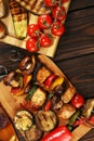 Assorted delicious grilled meat with vegetable on rustic table Royalty Free Stock Photo