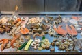 Assorted delicious seafoods grilled on big square pan in buffet Royalty Free Stock Photo