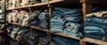 Assorted Denim Apparel Stacked On Shelves, Ready To Be Perused And Chosen