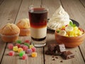 Assorted desserts and treats on wooden table Royalty Free Stock Photo
