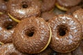 assorted donuts with chocolate frosted and glazed in the grocery store
