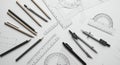 Assorted drafting tools arranged on a white surface include pencils, a mechanical Royalty Free Stock Photo