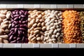 Assorted dried beans and lentils in a wooden box display Royalty Free Stock Photo