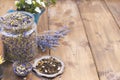 Assorted dried flowers and tea on a wooden background. Natural health. Aromatherapy. Free space for text. Copy space. Royalty Free Stock Photo