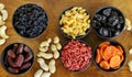 assorted dried fruits dried apricots dates raisins Royalty Free Stock Photo